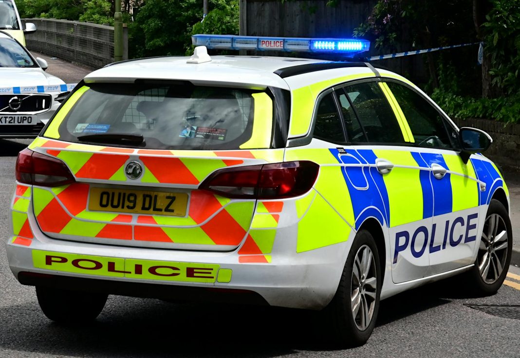 police car on a street in england